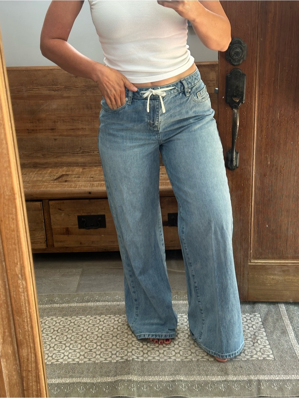 Mid rise, wide leg, drawstring jean size 6